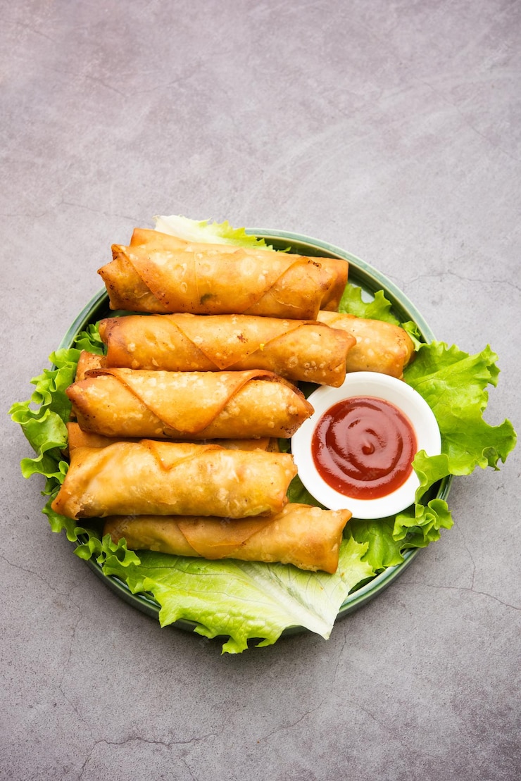 Premium Photo | Roll shaped cigar samosa are the perfect finger food ...