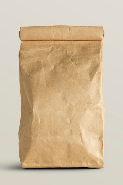 Rolled brown paper bag with copy space