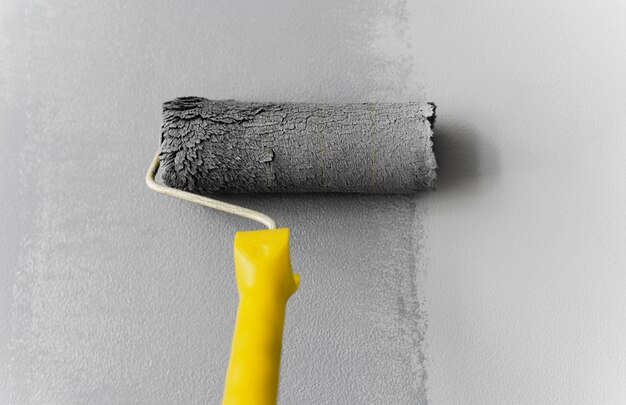 Roller painting wall gray color