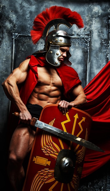 Roman warrior with muscular body holding sword and shield