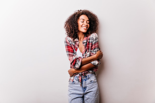 Romantic African Woman Smiling with Eyes Closed: Free Stock Photo