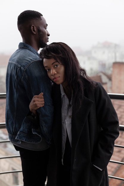 Romantic afroamerican couple on balcony