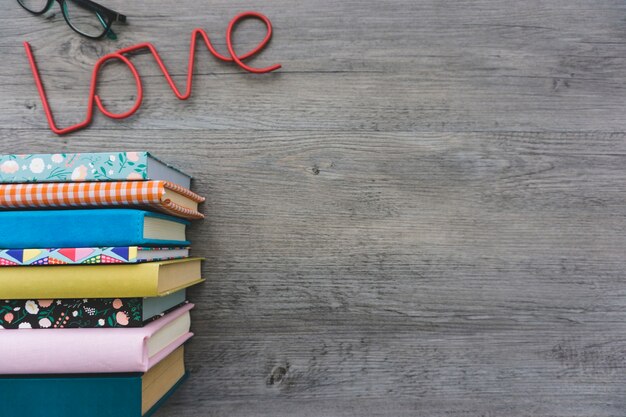 Romantic background with books and glasses