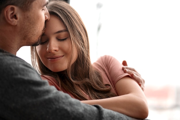 Free photo romantic couple celebrating valentine's day together at home