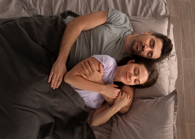 Romantic couple celebrating valentine's day together at home