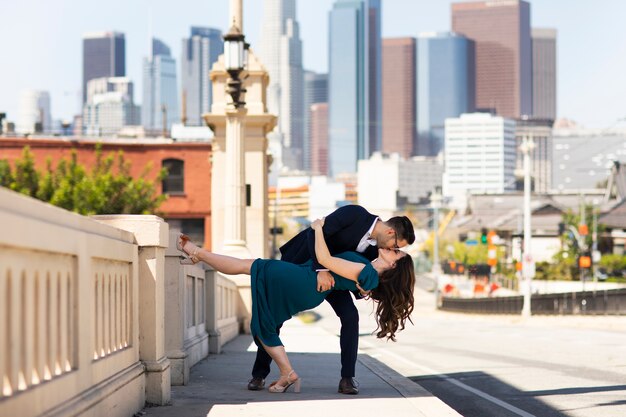 Romantic couple in the city celebrating engagement together