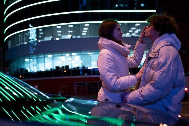 Romantic couple in the city at night