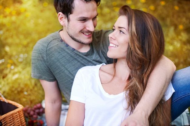 Romantic couple enjoying a picnic in the park