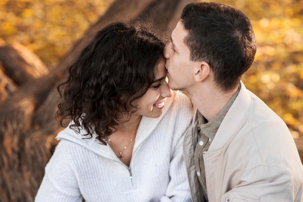 Free photo a romantic couple outdoors near a cafe