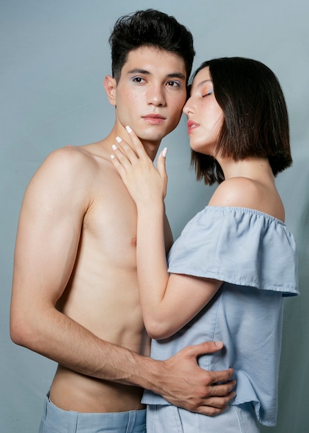 Romantic couple posing in studio