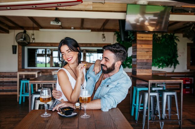 Romantic couple at table in restaurant