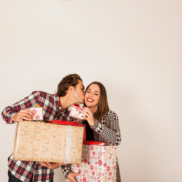 Romantic couple with present boxes