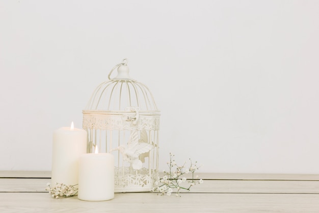 Romantic ornaments with candles and cage