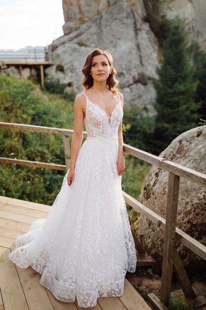 Romantic wedding couple in love walks in the mountains and forest