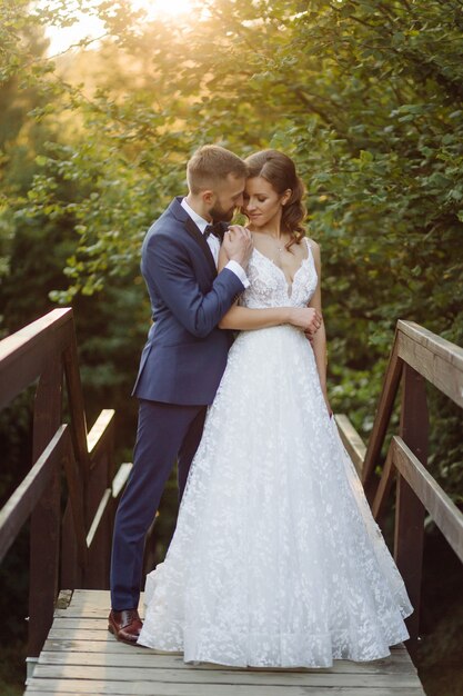 Romantic wedding couple in love walks in the mountains and forest