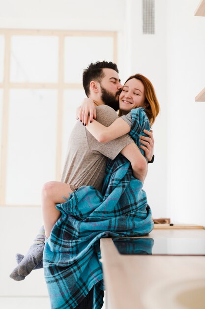 Romantic young couple hugging