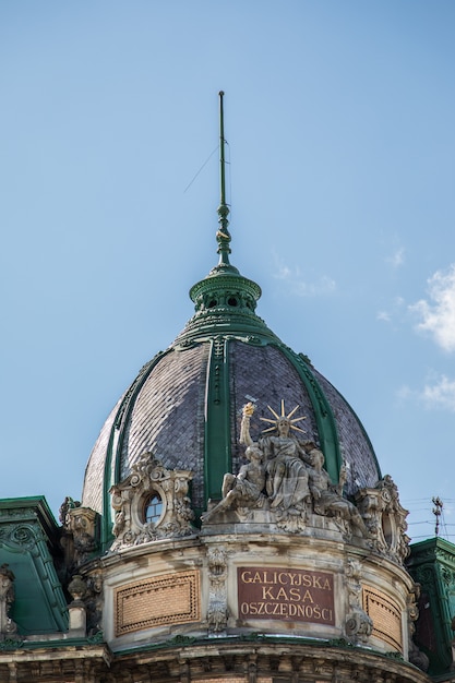 Roof of old building in front of blue sky in day time