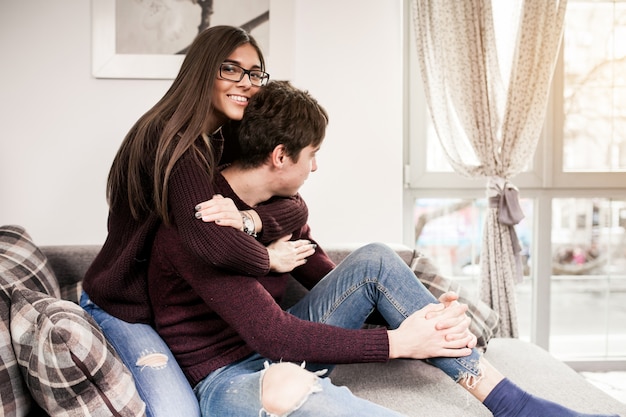 room couch young people couple