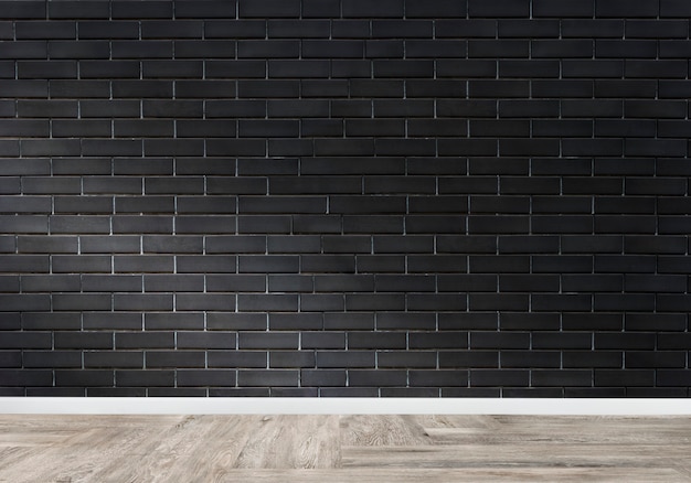 Free photo room with a black brick wall