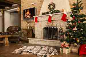 Free photo room with christmas tree and fire place