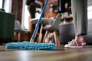 Free photo roommates cleaning home together