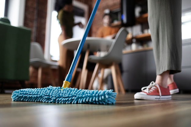 Roommates cleaning home together