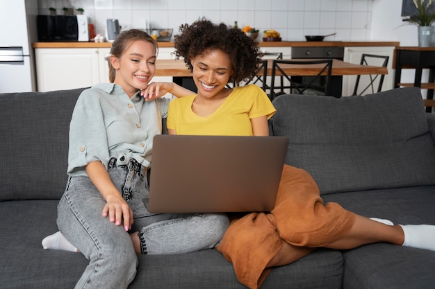 Free photo roommates sharing happy moments together