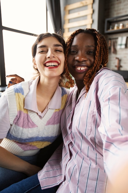 Free photo roommates spending time together