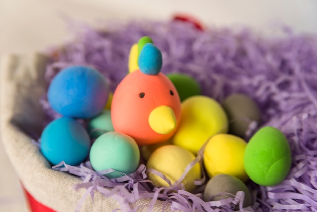 Free photo rooster eggs in tinsel nest