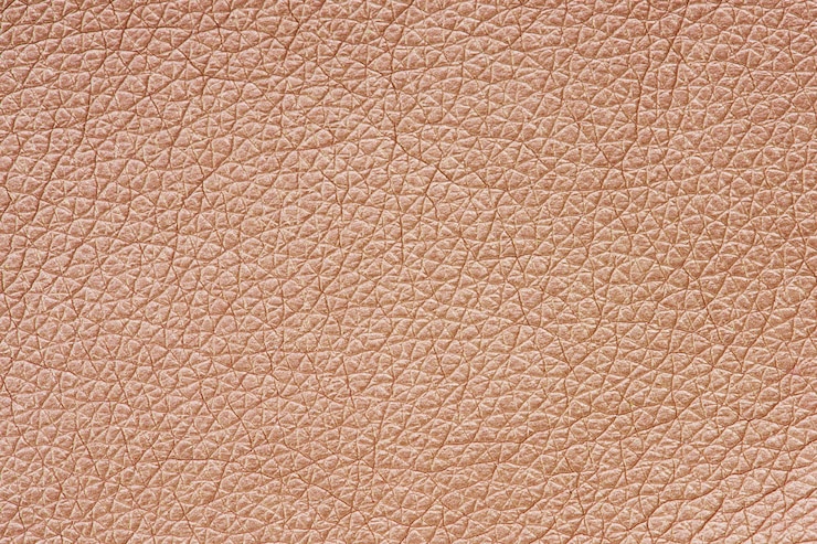 Free Photo rose gold leather textured background