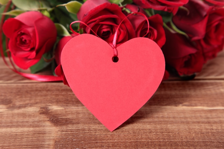 Free Photo roses with a romantic label