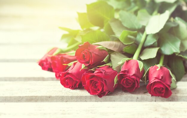 Roses on a wooden table