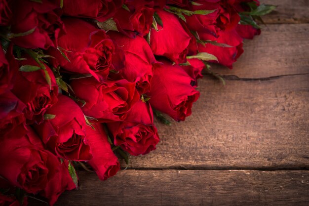 Roses on a wooden table