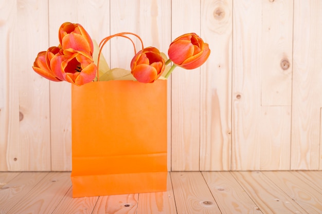 Roses in yellow bag