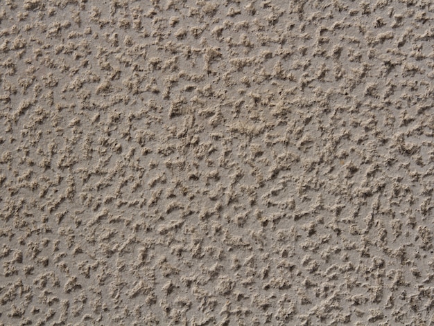 Rough beige plaster pattern