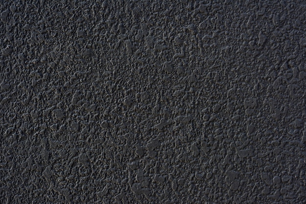 Rough black cement plastered wall texture