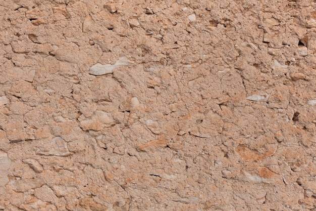 Free photo rough texture of stone wall