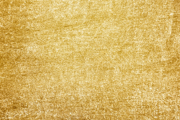 Roughly gold painted concrete wall surface background Free Photo