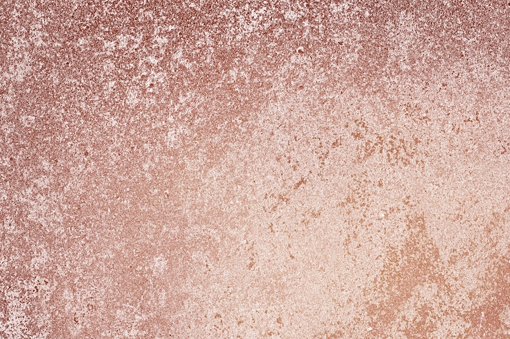 Free Photo roughly pink gold painted concrete wall surface background