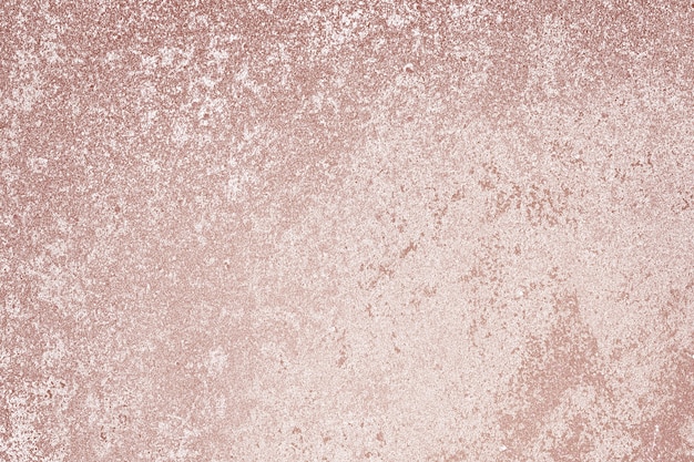 Roughly pink gold painted concrete wall surface