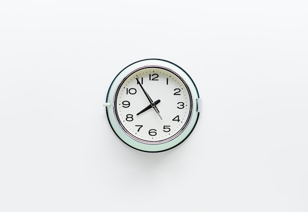 Round clock watch on white background