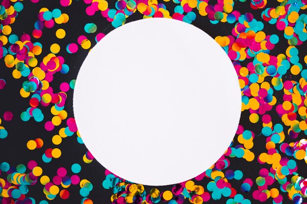 Round paper with scattered bright spangles