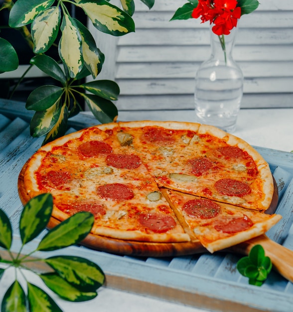 round pepperoni pizza on the table