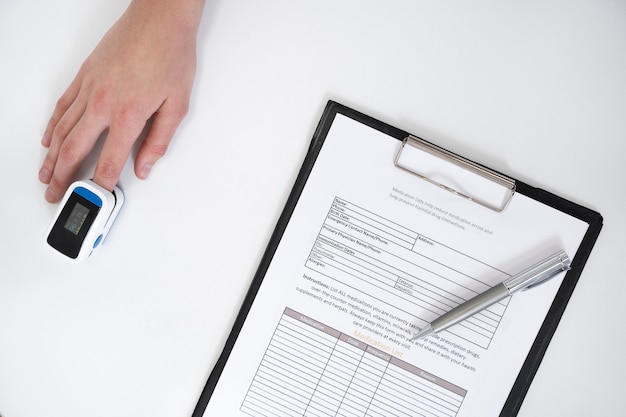 Free photo routine medical checkup with paperwork