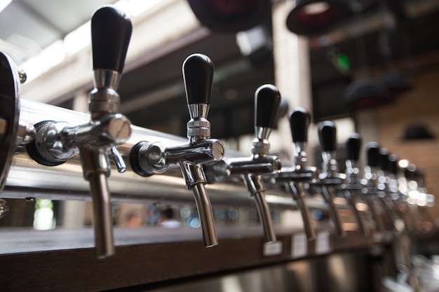 Row of Beer Taps in Pub