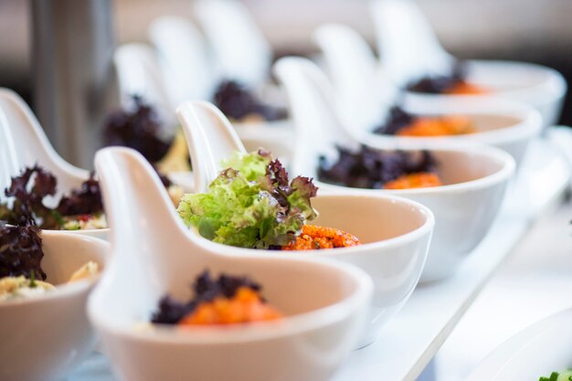 Row of bowls with salad