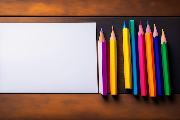 A row of colored pencils on a wooden table