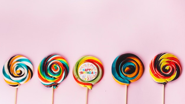 Free photo row of colorful lollipops