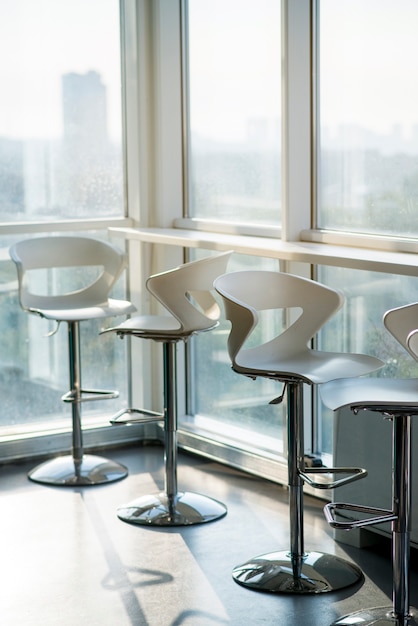 Row of empty chairs in office