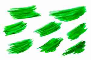 Free photo row of green watercolor brush strokes